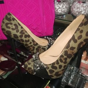 Green and black stilleto heels